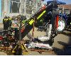 Backhoe, rear backhoe attachment